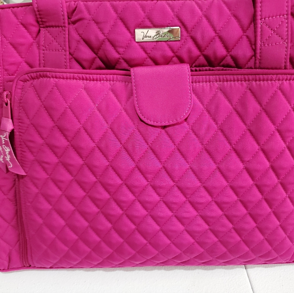 Vera Bradley diaper bag with changing pad.